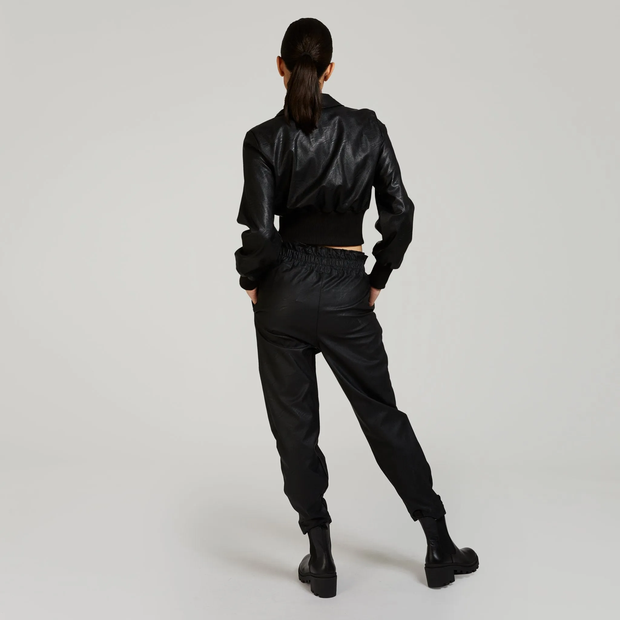 Belted vegan leather pants