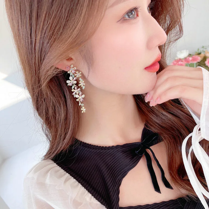 Female super fairy dinner dress with long flower heavy earrings