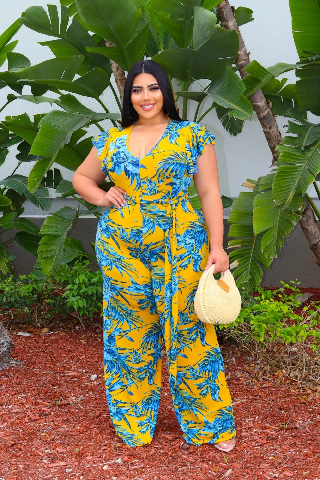 Final Sale Plus Size Faux Wrap Flutter Sleeve Jumpsuit with Tie in Mustard and Turquoise Leaf Print