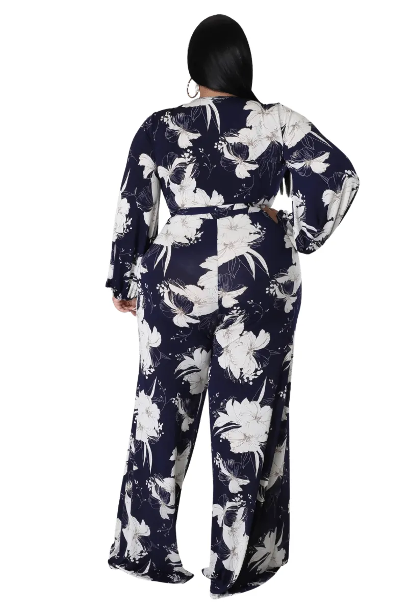 Final Sale Plus Size Faux Wrap Jumpsuit with Waist Tie in Navy and White Floral Print