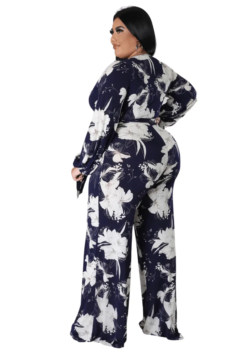 Final Sale Plus Size Faux Wrap Jumpsuit with Waist Tie in Navy and White Floral Print