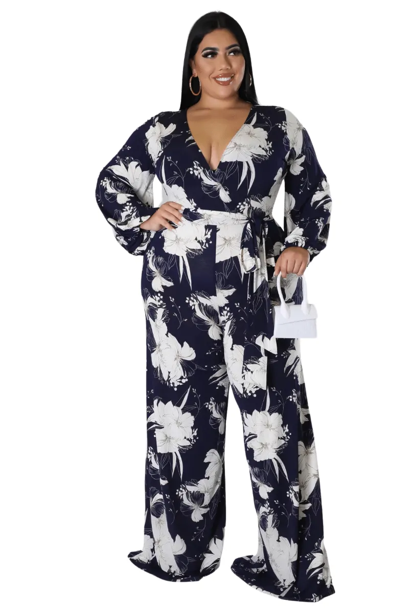 Final Sale Plus Size Faux Wrap Jumpsuit with Waist Tie in Navy and White Floral Print