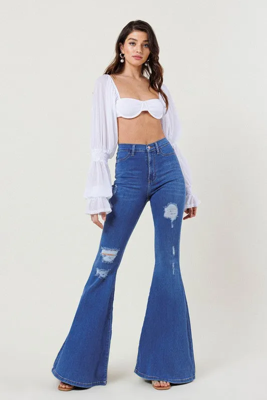 TEEK - High-Rise Distressed Flare Jeans