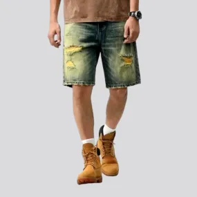 Yellow-cast distressed denim shorts for men